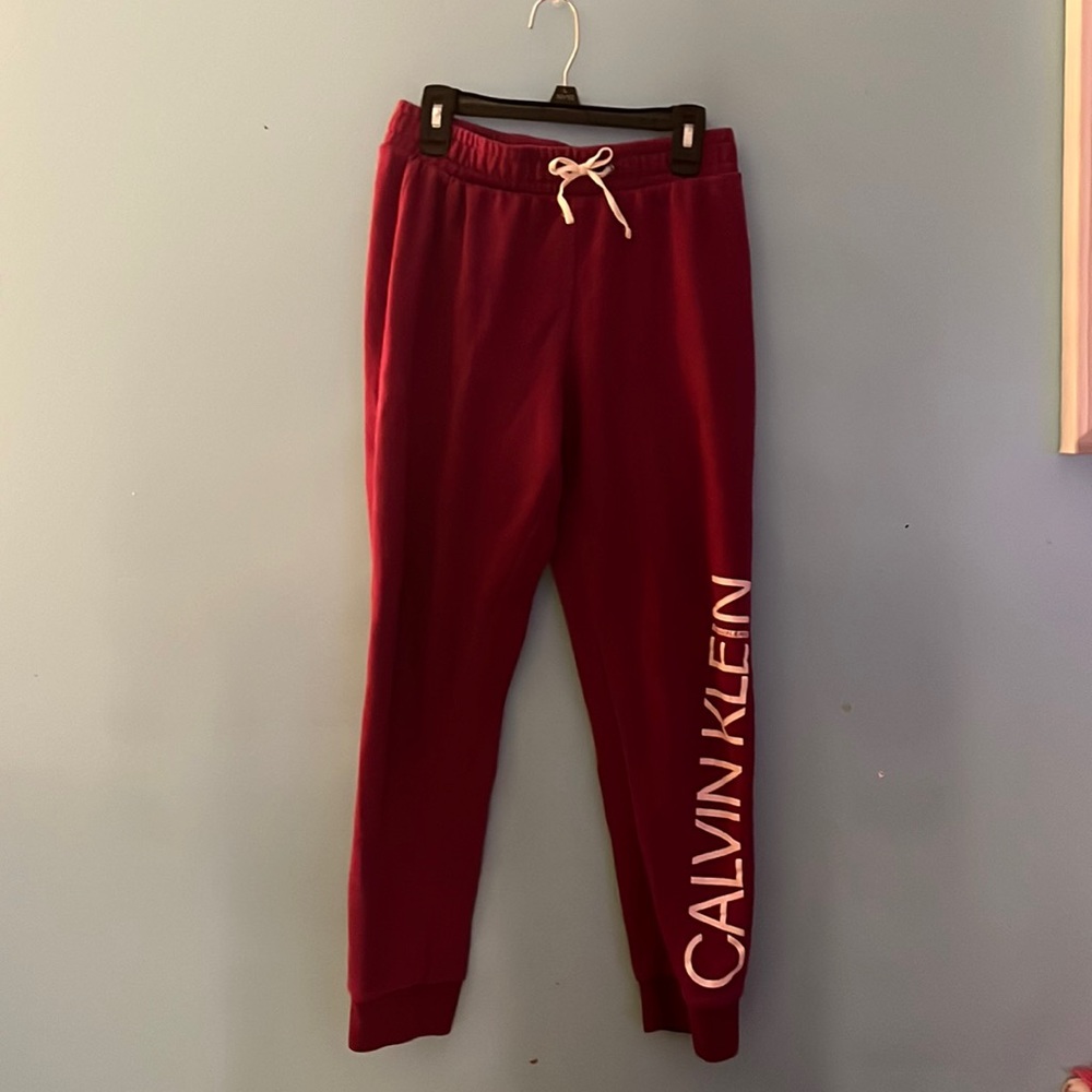 All orders ship 1-5 business days!
Calvin klein Burgundy sweatpants